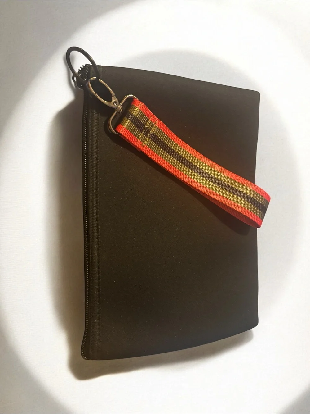 Haute Shore Beth Bello Neoprene Wristlet Pouch.